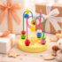 Színes fa golyóvezető fejlesztő játék ajándék csomagolásban, babáknak és kisgyermekeknek, természetes és biztonságos játék